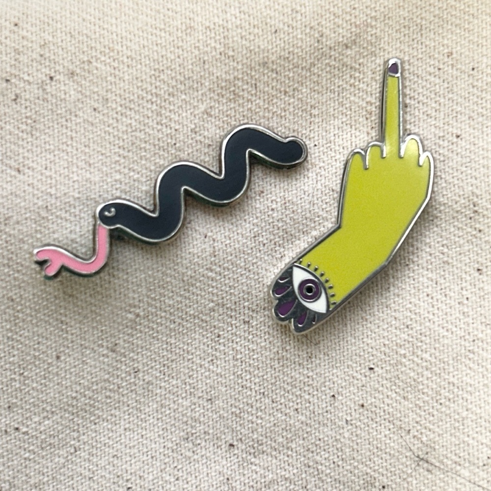 Unique Snake and Hand Enamel Pins